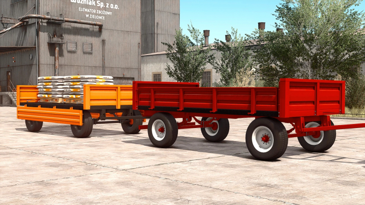 fs25-mods, FS25 mod Lizard 4TT v1.0.0.0 showing orange and red trailers with sacks at an industrial site.