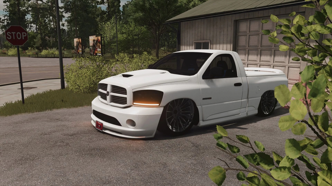 2004 Dodge Ram SRT-10 mod in FS25, parked outside garage