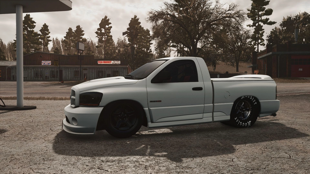 2004 Dodge Ram SRT-10 mod in FS25, parked near a country store.