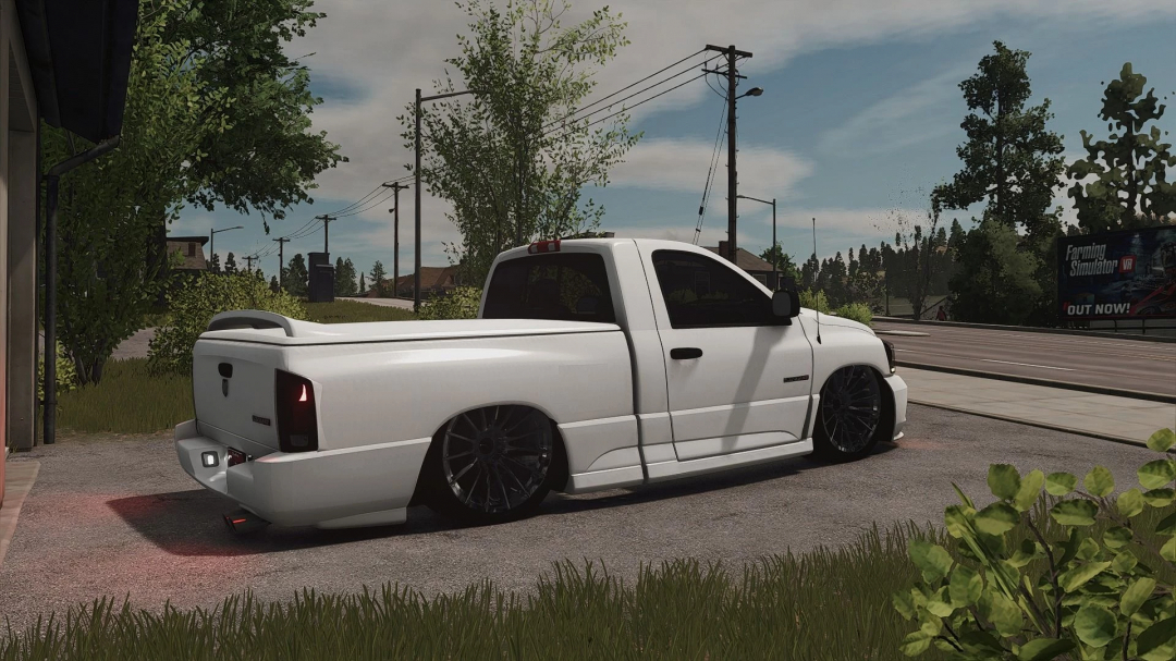 FS25 mod 2004 Dodge Ram SRT-10 parked on a roadside, showcasing sleek white design.