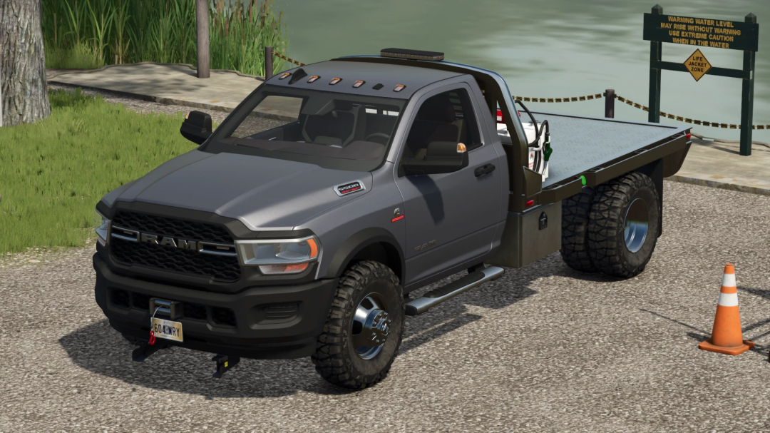 Dodge Ram 5500 truck mod for Farming Simulator 25, parked near water with a traffic cone.