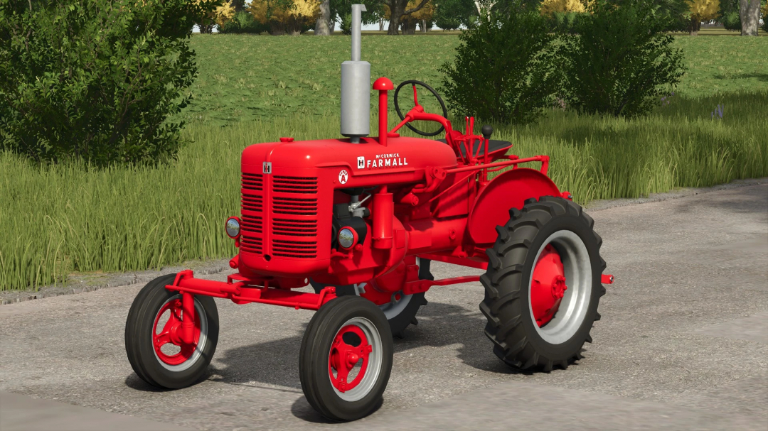 International Harvester Farmall tractor mod in FS25, showcasing vintage red design in a rural setting.