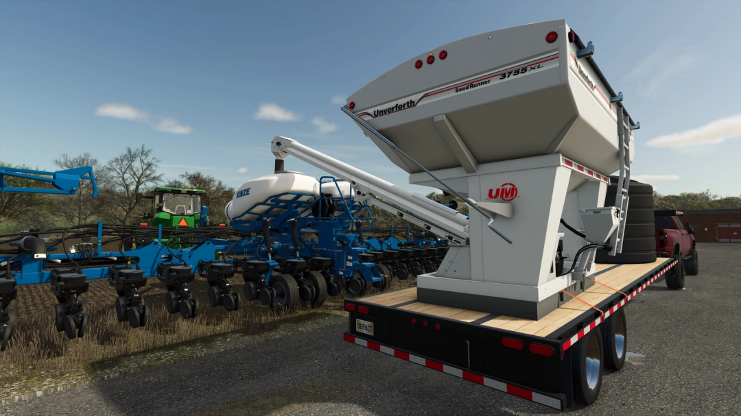 FS25 Seed Runner mod with planting equipment on trailer and tractor in field.