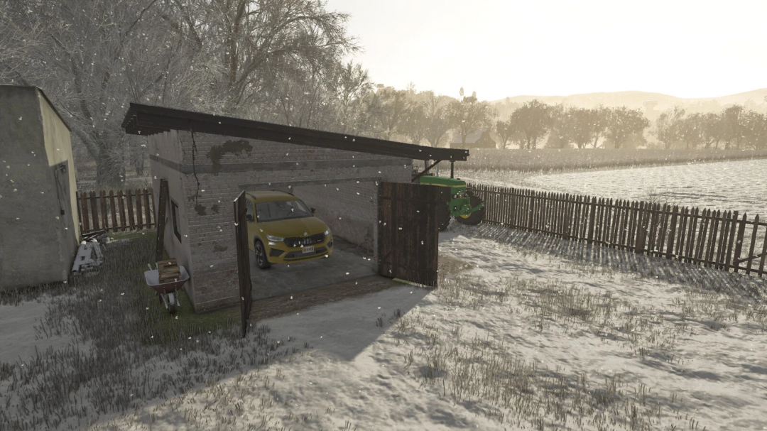 Small garage mod in FS25 with a yellow car and green tractor during snowfall.