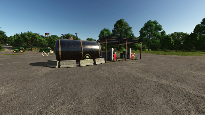 fs25-mods,  Diesel tank mod in FS25 with pumps and machinery in rural setting.