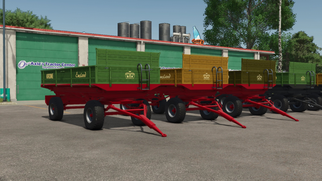 FS25 mod Krone Emsland v0.9.1.0 showing colorful trailers at Axle's Tractor Center.