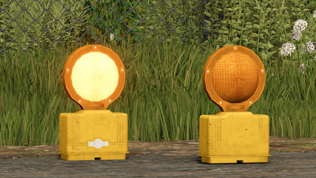 FS25 mod Strobe Light v1.0.0.0 showing two yellow warning lights on a grass surface.