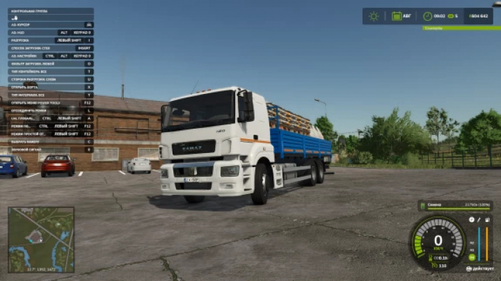 fs25-mods, Farming Simulator 25 mod: Kamaz 65207 v1.0.0.0 truck in a parking lot with cargo, game interface visible, part of FS25 mods collection.