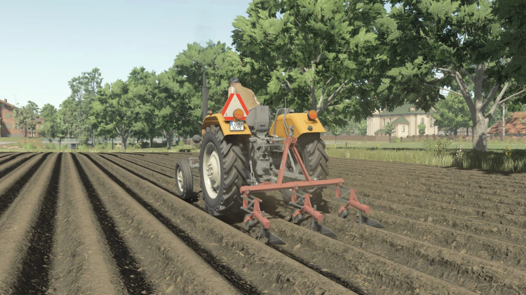 FS25 mod showing Agromet P431 plow on tractor in a plowed field with trees in the background.