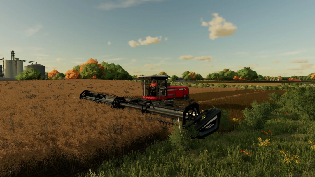 FS22 mod John Deere W260 with Macdon Swather in a wheat field.