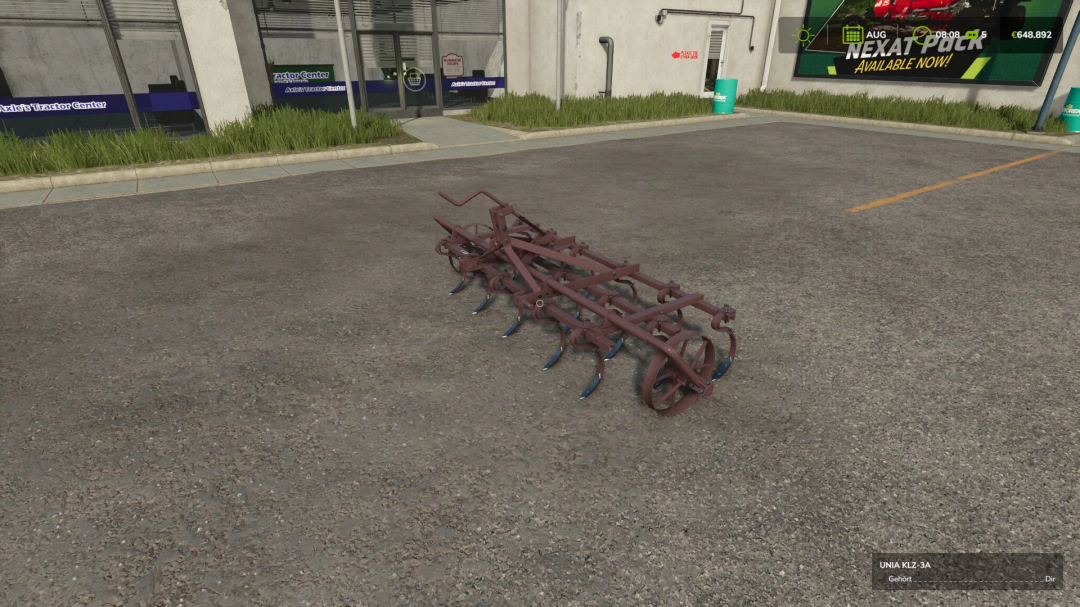 Farming Simulator 25 mods: Unia KLz-3A cultivator on a paved parking lot.