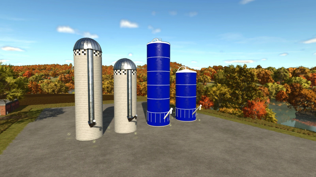 Farming Simulator 25 mods: four large silos, two are metal with checkered tops, and two are blue production silos in an outdoor setting.