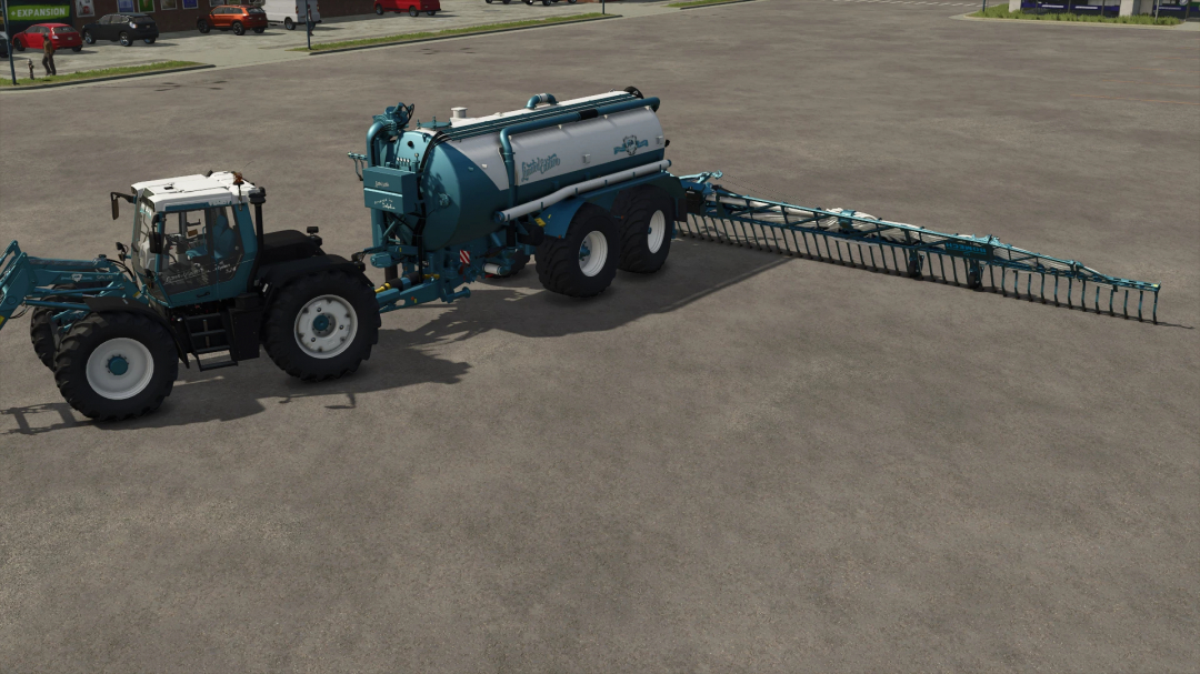 Farming Simulator 25 mod: Kaweco Pack Dolphin Edition with liquid tanker and extendable rake attachment on a gravel lot.