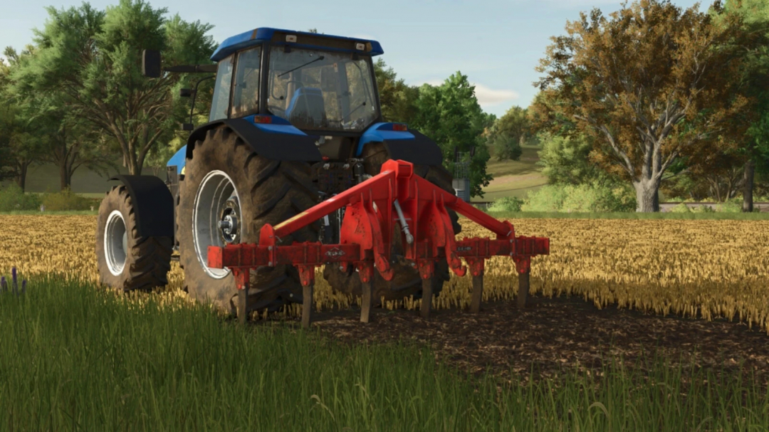 Farming Simulator 25 mod: Blue tractor with red Kuhn DC pack implement working on a field in a rural landscape.