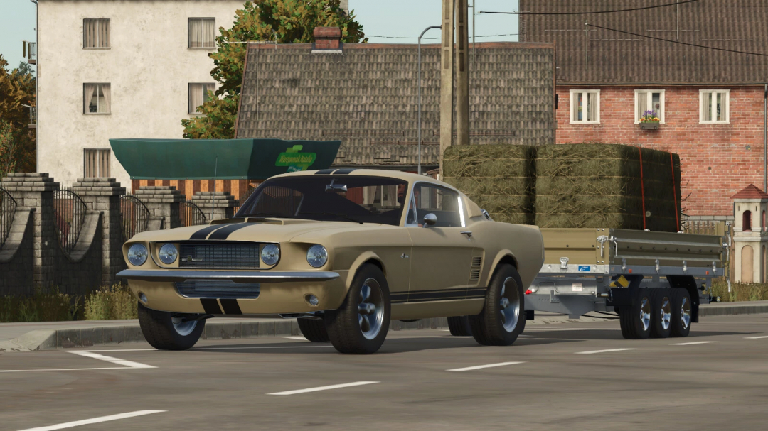In-game image of a vintage muscle car with a trailer loaded with hay bales, from the Farming Simulator 25 mod Lizard Muscle v1.0.0.0.