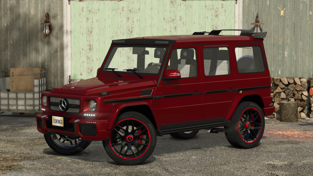 Red Mercedes Benz G65 AMG from FS25 mods, parked outdoors with wood logs and green and grey wooden walls in the background.