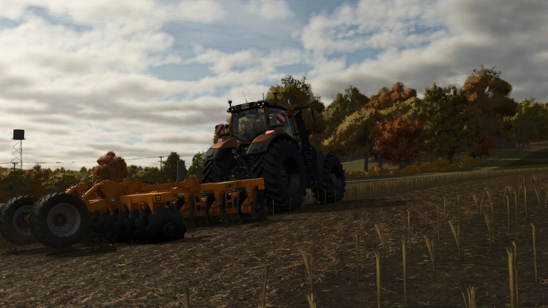 Farming Simulator 25 mod: A tractor working on a field during autumn, featuring the TT Big TT v1.0.0.0 mod from FS25 mods.