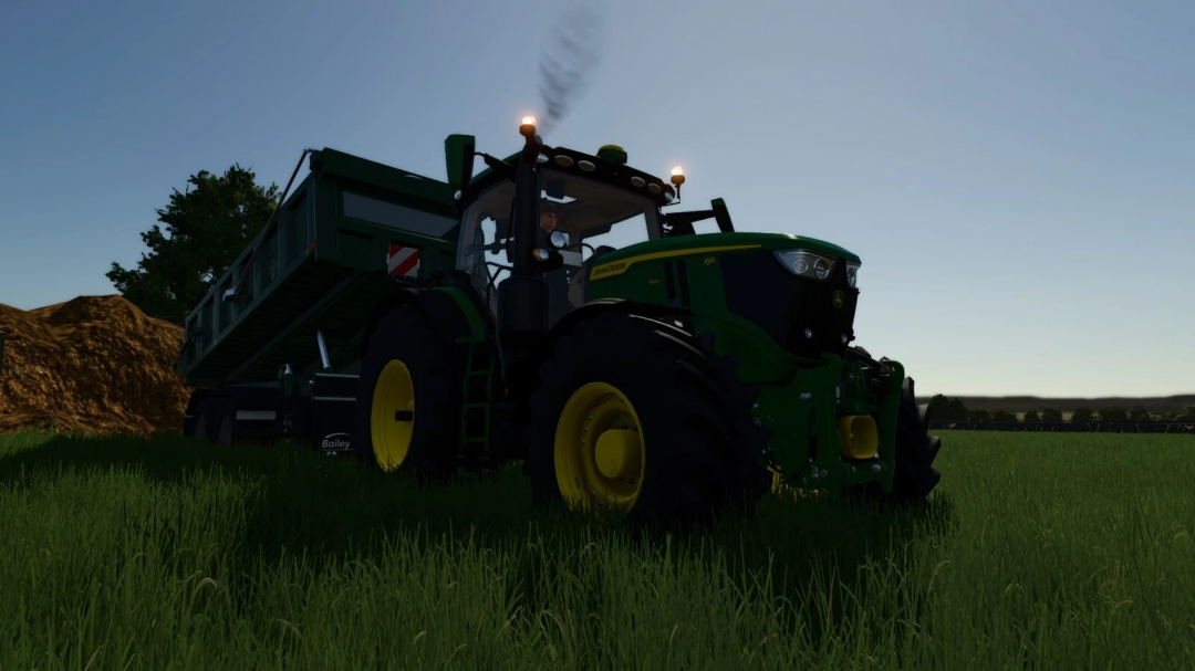 John Deere tractor with manure sell point mod in Farming Simulator 25, realistic farm equipment for FS25 mods.