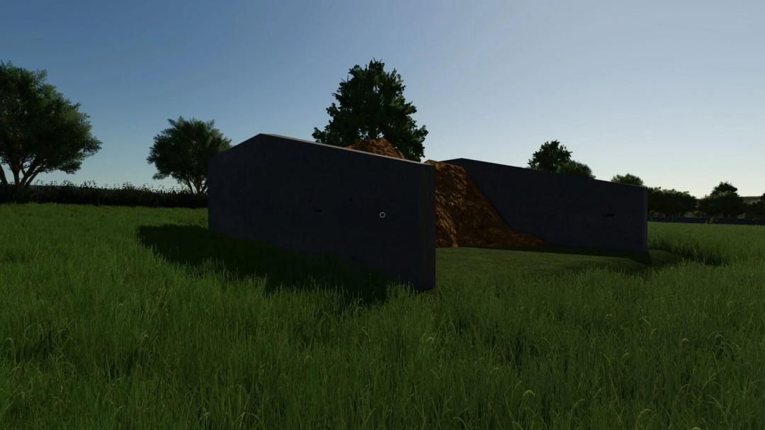 Farming Simulator 25 mod: Manure Sell Point with a manure pile, located in a grassy field against a backdrop of trees under a clear sky.