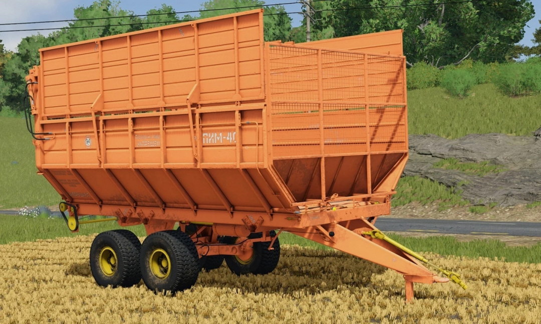 Orange farm trailer with mesh sides and dual wheels, used for transporting crops in Farming Simulator 25 mods.