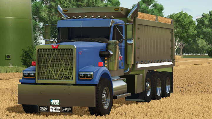 fs25-mods,  Farming Simulator 25 mod: Blue Western Star 4964 dump truck with detailed cabin, large cargo bed, and realistic rural background.