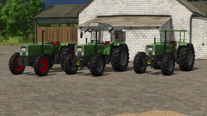 fs25-mods, Three Fendt Favorit 600 SA tractors from the FS25 mods pack parked outside a farm building in Farming Simulator 25.