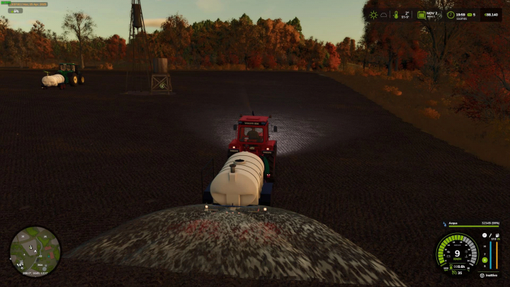 fs25-mods, Farming Simulator 25 mod: a tractor with a water tank attached for irrigation, set in a fall landscape with autumn trees in the background.