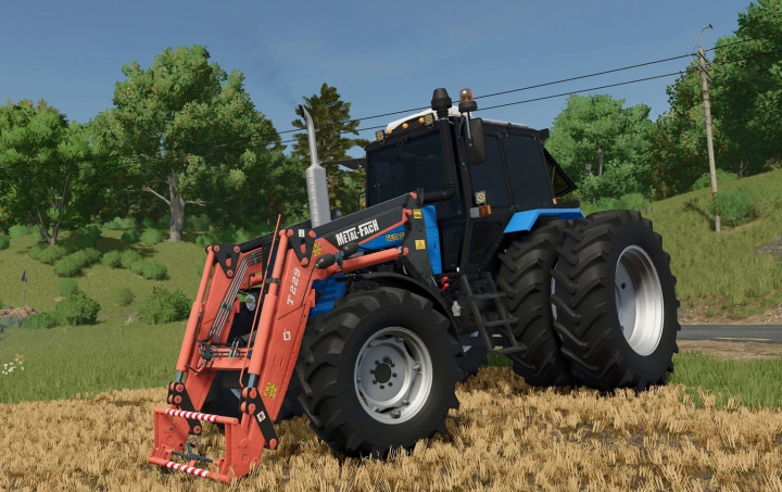fs25-mods,  FS25 mod tractor with MetalFach T229 front loader attachment on a farm field, part of Farming Simulator 25 mods.