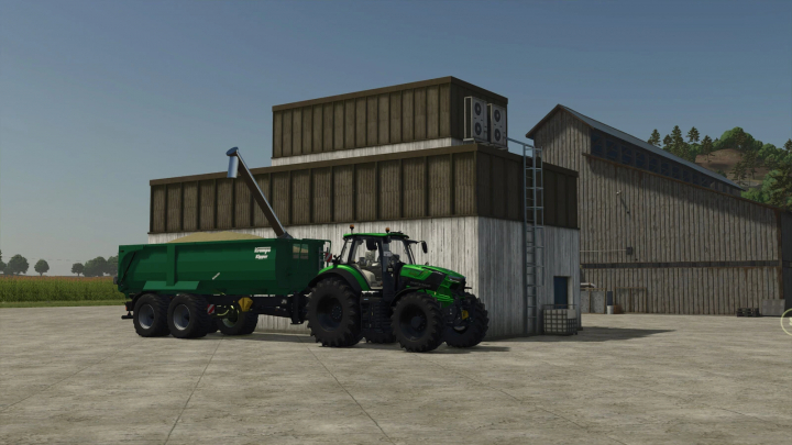 fs25-mods,  Farming Simulator 25 mod: Green tractor with a pig food mixer trailer parked near a barn.