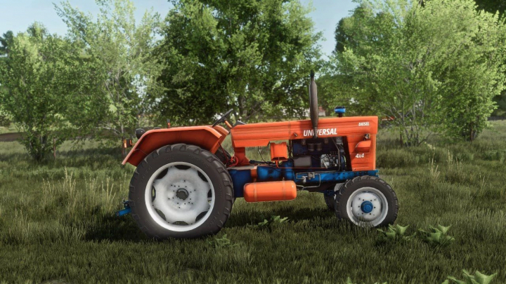 fs25-mods, Farming Simulator 25 mod: UTB 651 tractor in a grassy field with trees, showcasing the FS25 mods collection.