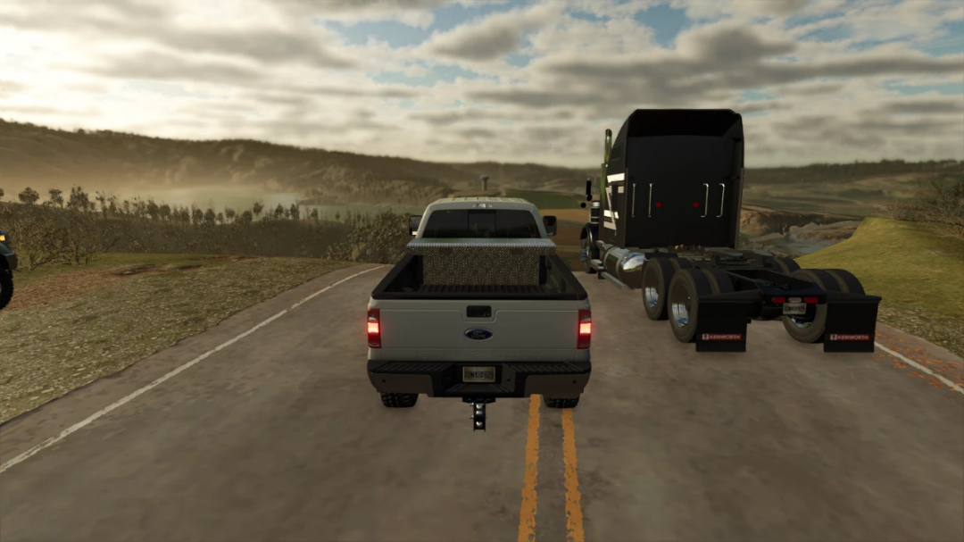 Farming Simulator 25 mod: Ford F350 Rework v1.1.0.0, shown as a pickup truck with a truck in the background on a country road.