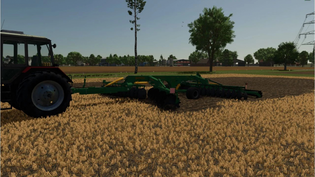 Farming Simulator 25 mod: DiskoPak 6-01 v1.0.0.0 attached to tractor in a wheat field.