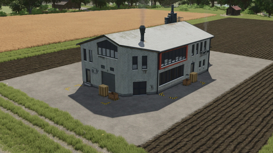 Farming Simulator 25 mod: Factory building with pallets and boxes outside, surrounded by farmland and fields.