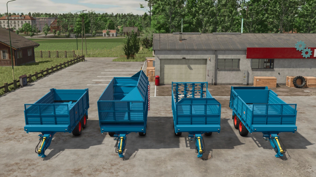 Four blue farming trailers from the Fortschritt T 088 Pack mod for Farming Simulator 25, lined up outdoors near a gray building.