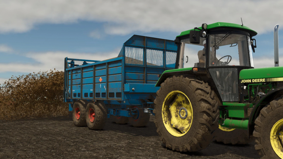 John Deere tractor pulling a blue farming trailer on a farm with soil and plants, part of Farming Simulator 25 mods, Fortschritt T 088 Pack.