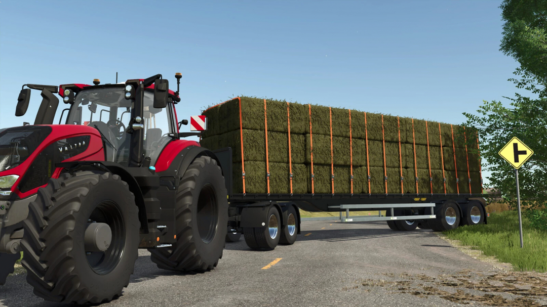 Farming Simulator 25 mod: Red tractor with a flatbed trailer loaded with hay bales, representing the Lizard Flatbed Trailer v1.0.0.0 mod.