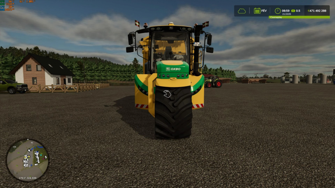 Farming Simulator 25 mod: Oxbo AT5105 Edit v1.0.0.0 tractor viewed from the front on a farm yard