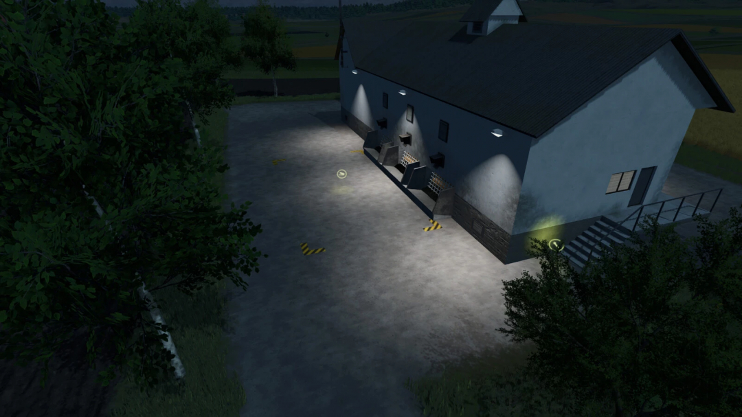 Night view of the pig food production facility in Farming Simulator 25, illuminated with outdoor lights, part of FS25 mods.