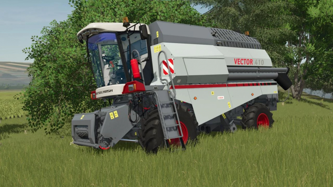 Farming Simulator 25 mod: RSM Vector 410 harvester in a field with green grass and trees, showcasing modern agricultural equipment.