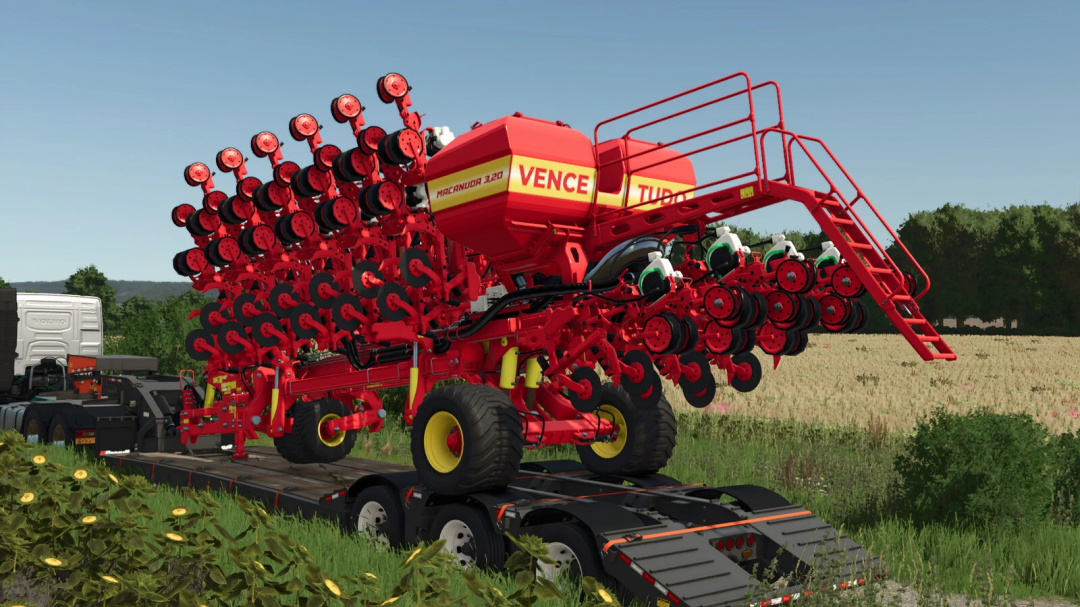 Farming Simulator 25 mod: Vence Tudo Macanuda 3.20 v1.0.0.0, a red seed drill with multiple mounted wheels, on a trailer in a field.
