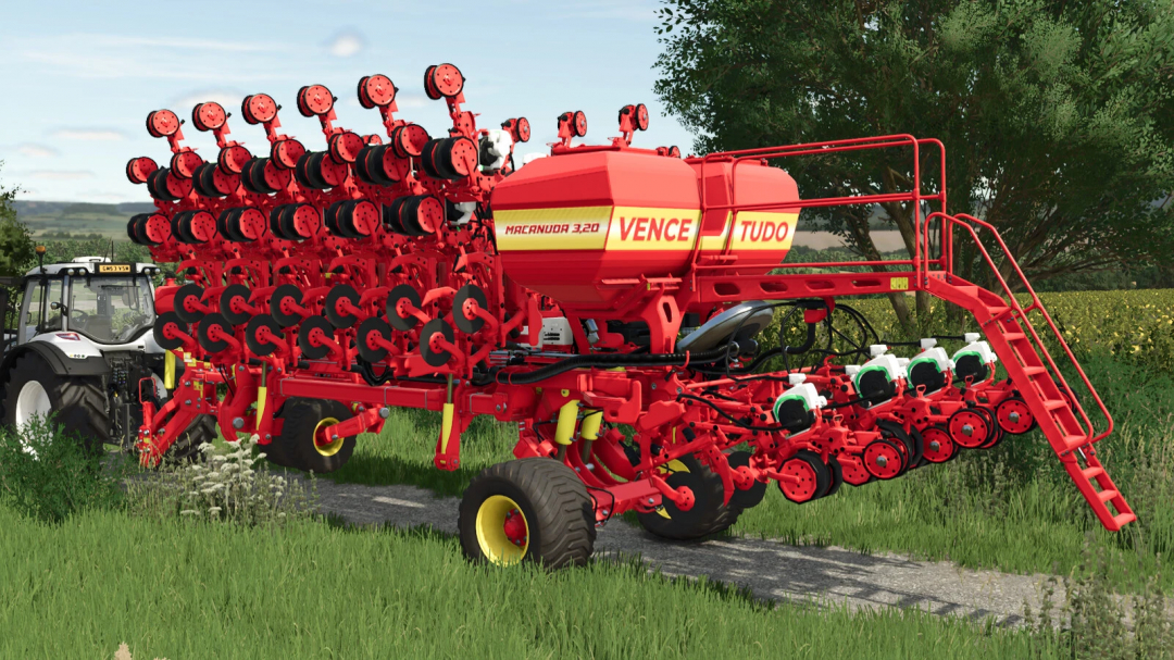 Farming Simulator 25 mod: Red Macanuda 3.20 Vence Tudo agricultural machine attached to tractor in outdoor field.