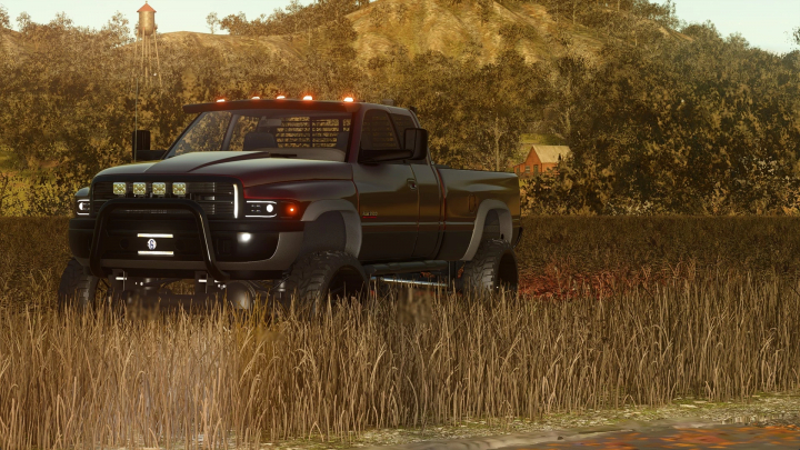 fs25-mods, Farming Simulator 25 mod: Black Ram 3500 pickup truck parked in a field during sunset, showcasing detailed textures and off-road tires.