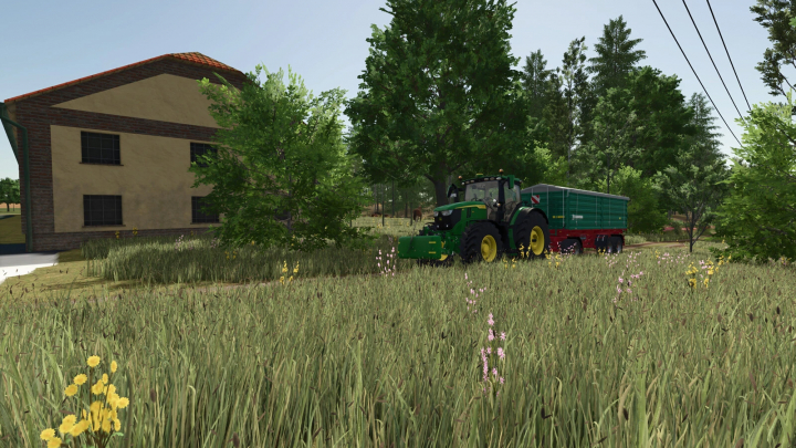 fs25-mods,  Farming Simulator 25 mod image showing a large tractor with a trailer near a farmhouse and trees in the field. Keywords: FS25 mods, Farming Simulator 25 mods.