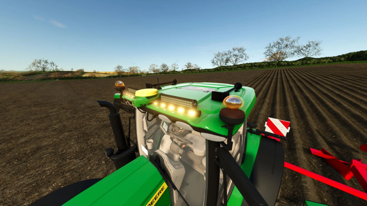 fs25-mods,  Close-up of a green John Deere tractor from Farming Simulator 25, showing the cab and LED light bar during plowing on a farm field.