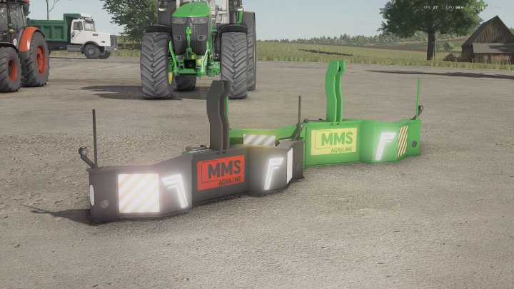 fs25-mods, Farming Simulator 25 mod: MMS Safety Bumper 140 & 110kg v1.0.0.0 on a farm yard with tractors in the background.