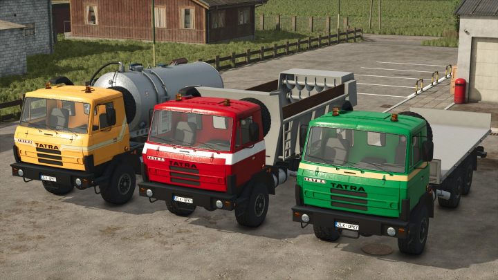 fs25-mods, Three Tatra trucks in yellow, red, and green, from the Farming Simulator 25 mods, parked outside with equipment on trailers.