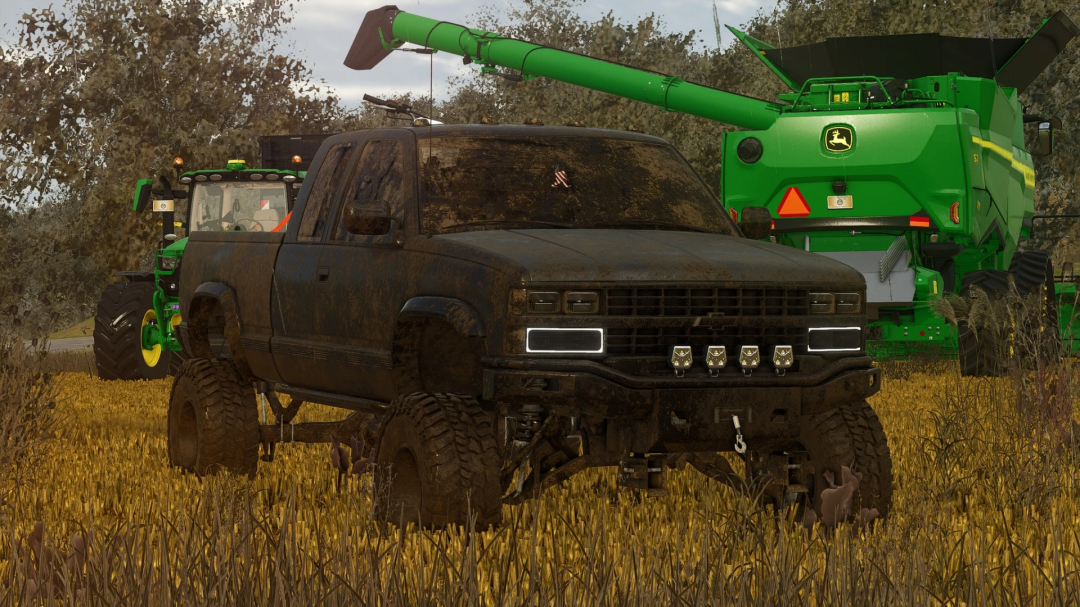 Farming Simulator 25 mod featuring a black, muddy truck and green John Deere equipment in a field.