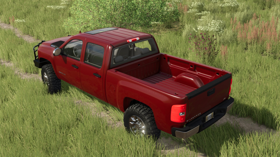 Farming Simulator 25 mod: 2012 Chevy Silverado pickup truck in a grassy field, available for FS25 mods enthusiasts.