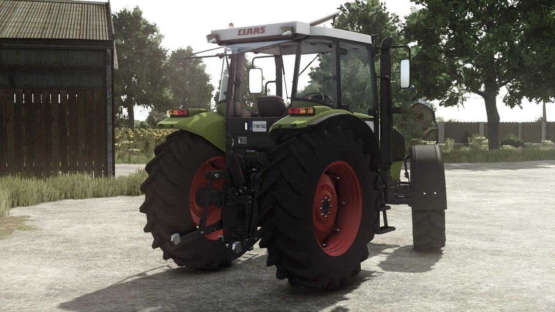 Claas Ares 600 tractor mod in Farming Simulator 25, viewed from the rear on a farmyard, with trees and a shed in the background.