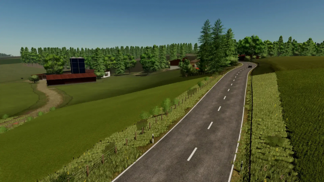 Scenic rural road in Farming Simulator 25 with lush fields and trees, showcasing the FS25 mod FBM25 Sonnental v2.0.1.0.